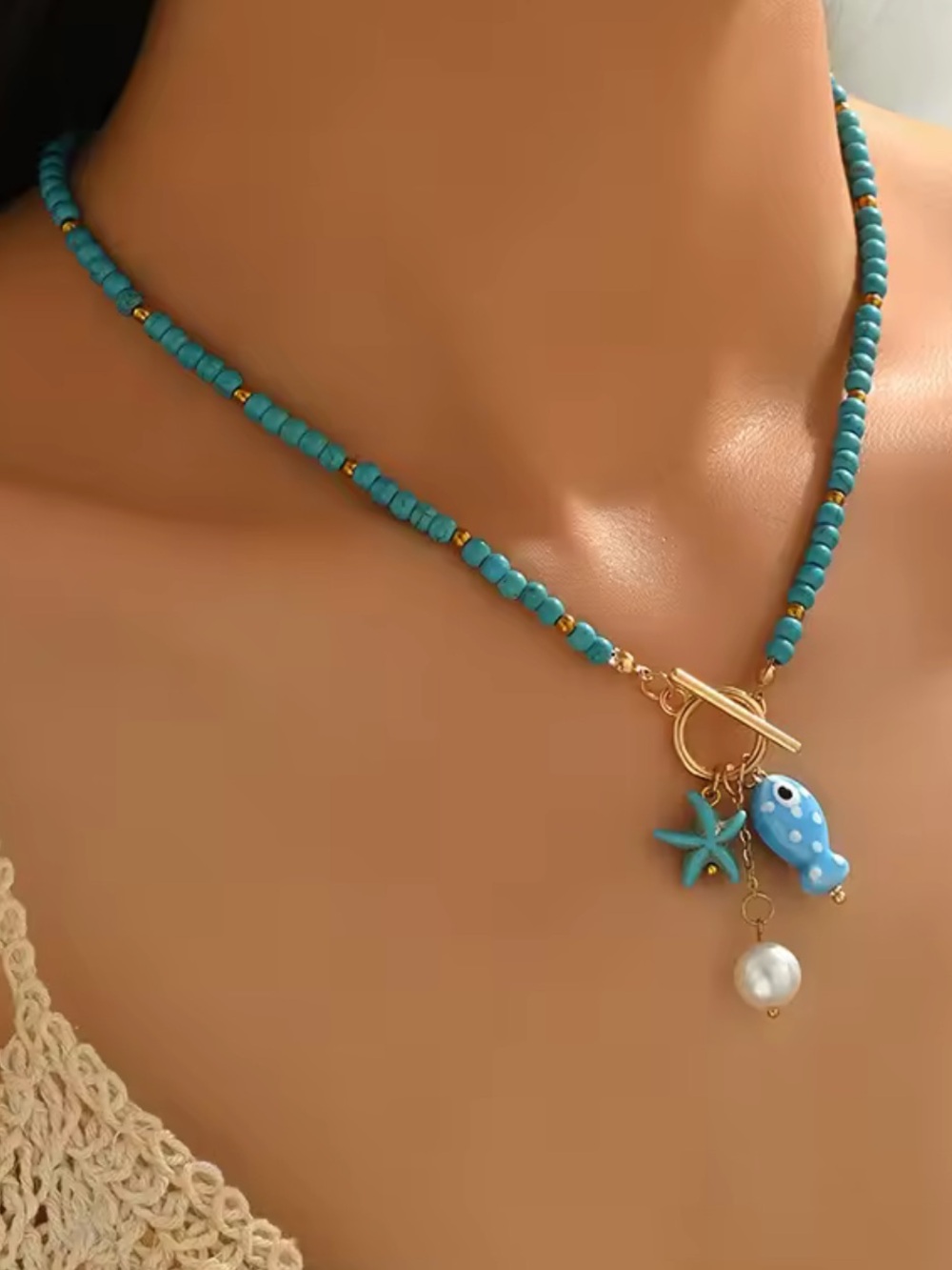 Turquoise Beaded Necklace with Gold Accents & Ocean Charms
